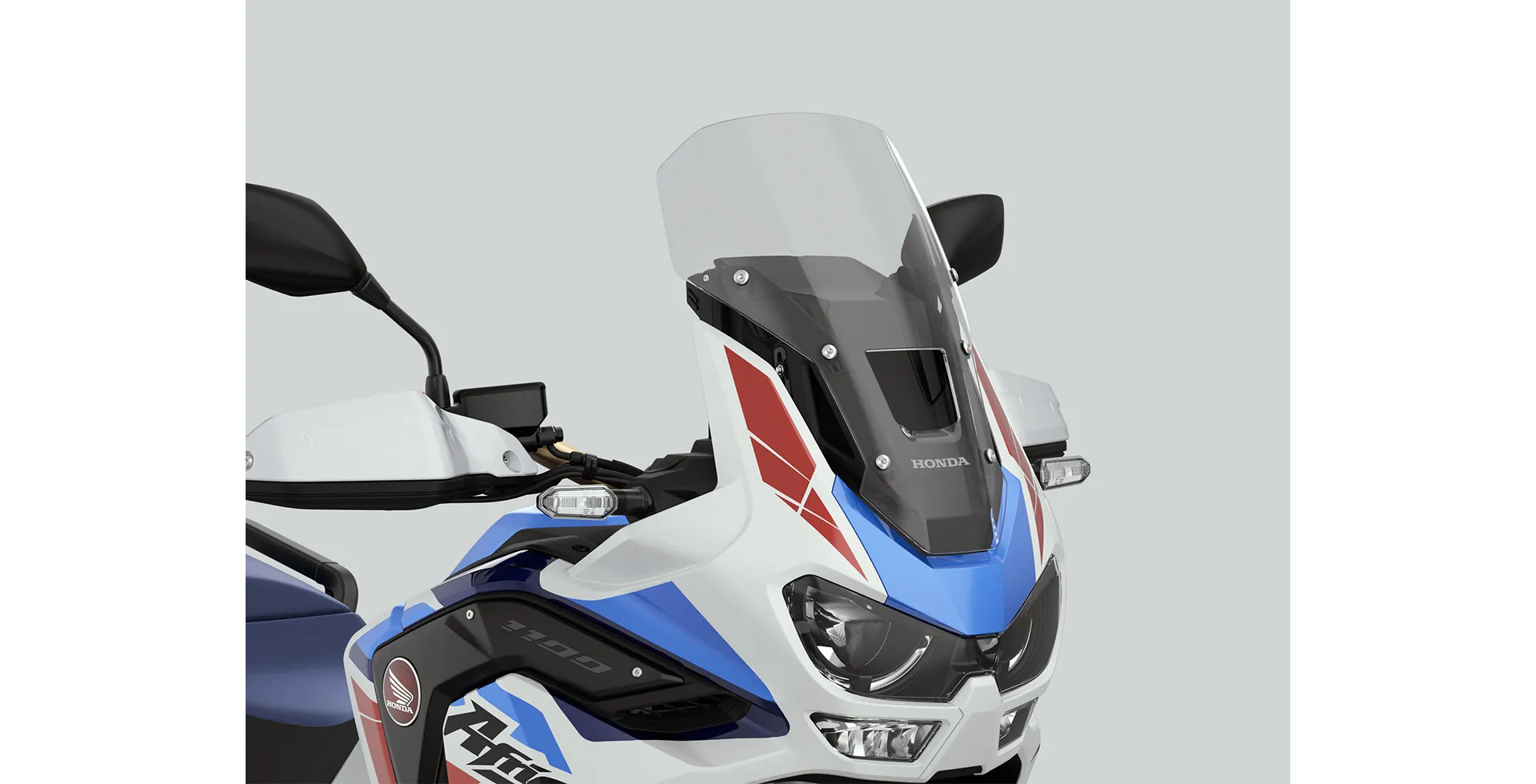 detalhe-parabrisa-moto-honda-crf-1100l-africa-twin-adventure-sports-2023-branco-perolizado
